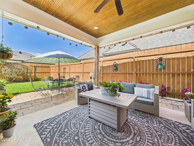 111 Croft Row, Lafayette, LA 70503 - view of patio with fence, a ceiling fan, outdoor dining space, and an outdoor hangout area