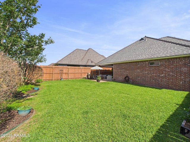 111 Croft Row, Lafayette, LA 70503 - view of yard with a fenced backyard and a patio area