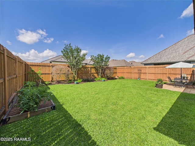 111 Croft Row, Lafayette, LA 70503 - view of yard with a fenced backyard, a patio area, and a vegetable garden