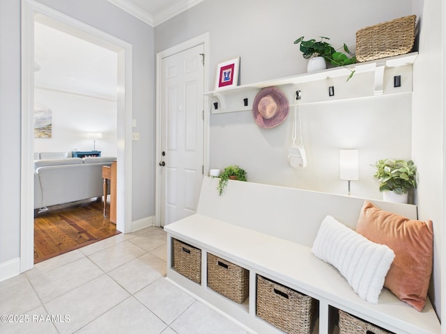 111 Croft Row, Lafayette, LA 70503 - mudroom featuring crown molding and light tile patterned flooring