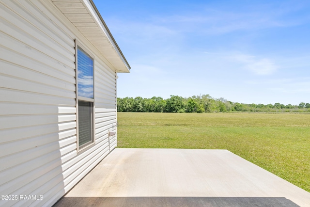 view of patio / terrace featuring a rural view