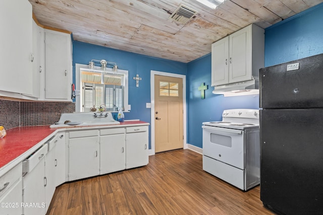 kitchen featuring a sink, freestanding refrigerator, under cabinet range hood, white cabinetry, and white electric range