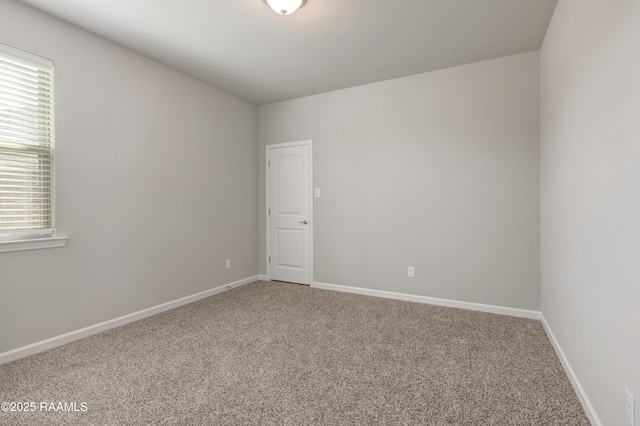213 Grace View Dr, Lafayette, LA 70506 - carpeted empty room featuring plenty of natural light and baseboards