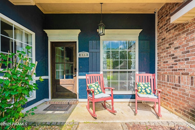 property entrance featuring covered porch
