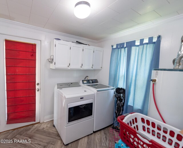 1207 Oak St, Ville Platte, LA 70586 - washroom featuring crown molding, cabinet space, and washer and clothes dryer