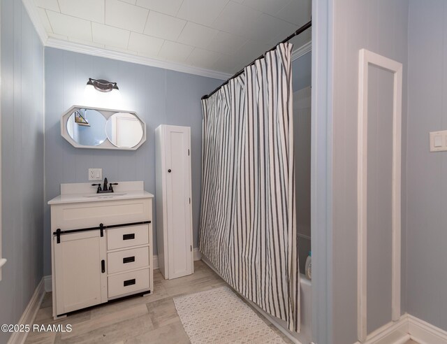 1207 Oak St, Ville Platte, LA 70586 - bathroom with vanity, ornamental molding, and shower / tub combo