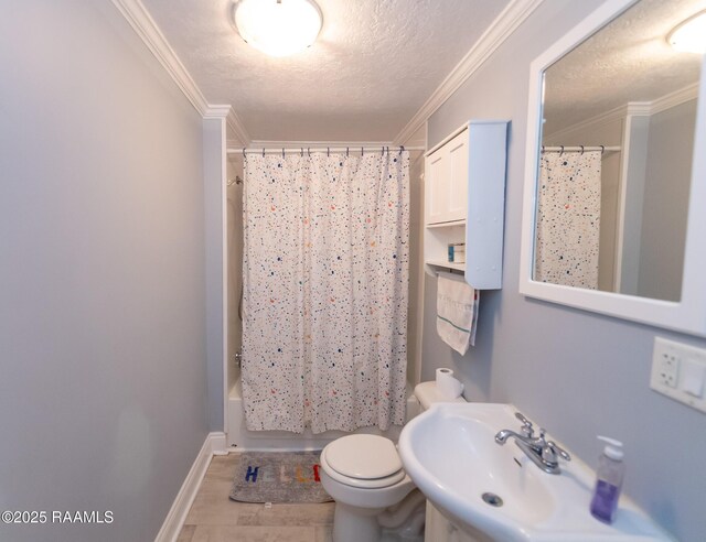 1207 Oak St, Ville Platte, LA 70586 - bathroom with crown molding, a textured ceiling, wood finished floors, and toilet