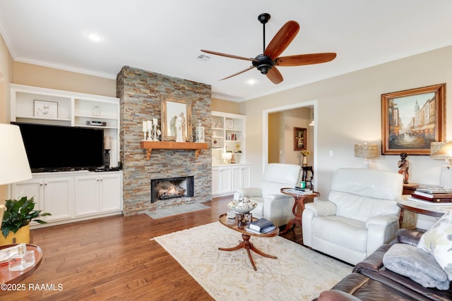 202 N Anita St, Lafayette, LA 70501 - living room with a fireplace, ceiling fan, wood finished floors, and ornamental molding