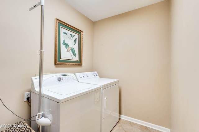 202 N Anita St, Lafayette, LA 70501 - washroom with light tile patterned floors, baseboards, washer and dryer, and laundry area