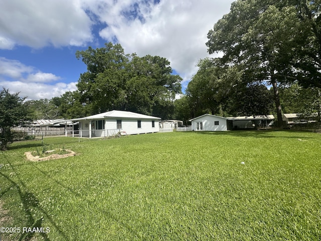 view of yard featuring fence