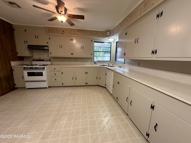 kitchen with white appliances, light countertops, a ceiling fan, under cabinet range hood, and visible vents