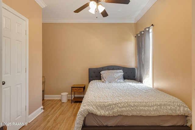 111 Bottle Brush Ln, Carencro, LA 70520 - bedroom featuring crown molding, baseboards, ceiling fan, and wood finished floors