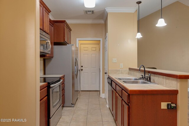 111 Bottle Brush Ln, Carencro, LA 70520 - kitchen featuring visible vents, a sink, light tile patterned floors, a peninsula, and stainless steel appliances