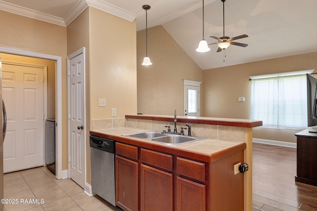 111 Bottle Brush Ln, Carencro, LA 70520 - kitchen featuring a ceiling fan, brown cabinets, dishwasher, a sink, and a peninsula