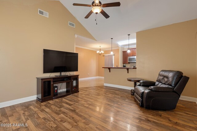 111 Bottle Brush Ln, Carencro, LA 70520 - living room featuring baseboards, visible vents, dark wood finished floors, and ceiling fan with notable chandelier