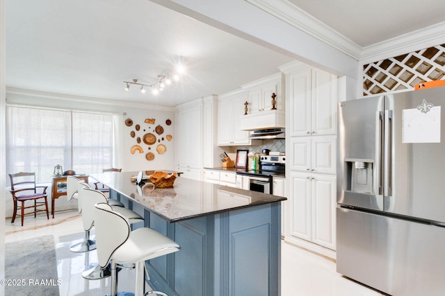 112 Hillside Dr Unit 3, Lafayette, LA 70503 - kitchen with ornamental molding, white cabinets, appliances with stainless steel finishes, and a kitchen bar