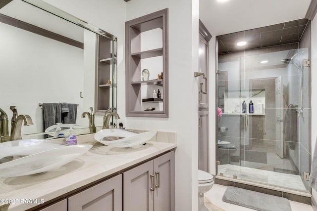 112 Hillside Dr Unit 3, Lafayette, LA 70503 - bathroom with a sink, toilet, double vanity, and a stall shower