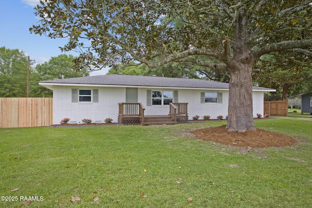 1013 Young St, Broussard, LA 70518 - single story home featuring brick siding, fence, a shingled roof, and a front yard