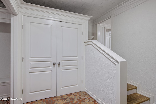 1013 Young St, Broussard, LA 70518 - stairs featuring a textured wall, baseboards, and crown molding