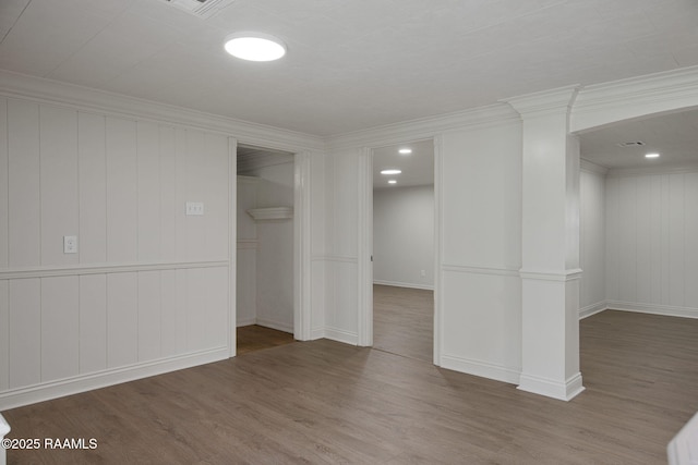 1013 Young St, Broussard, LA 70518 - unfurnished bedroom with wood finished floors, crown molding, and baseboards