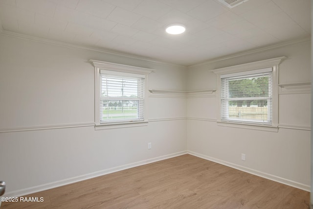 1013 Young St, Broussard, LA 70518 - empty room with light wood-style floors and ornamental molding