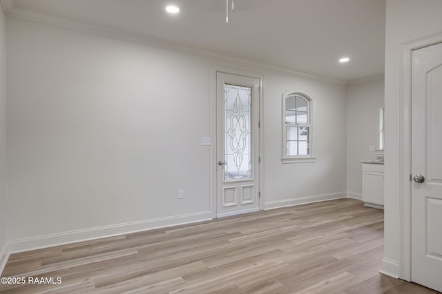1013 Young St, Broussard, LA 70518 - entrance foyer with recessed lighting, light wood-style floors, baseboards, and ornamental molding