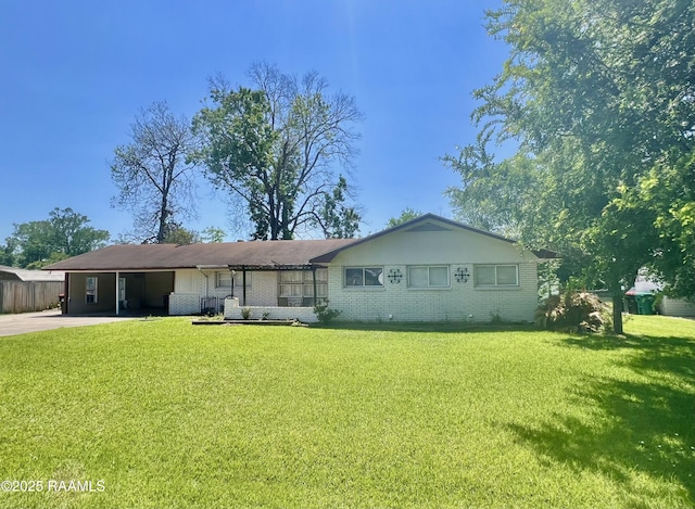 820 Genevieve Dr, Lafayette, LA 70503 - ranch-style home with brick siding, a front lawn, concrete driveway, and an attached carport