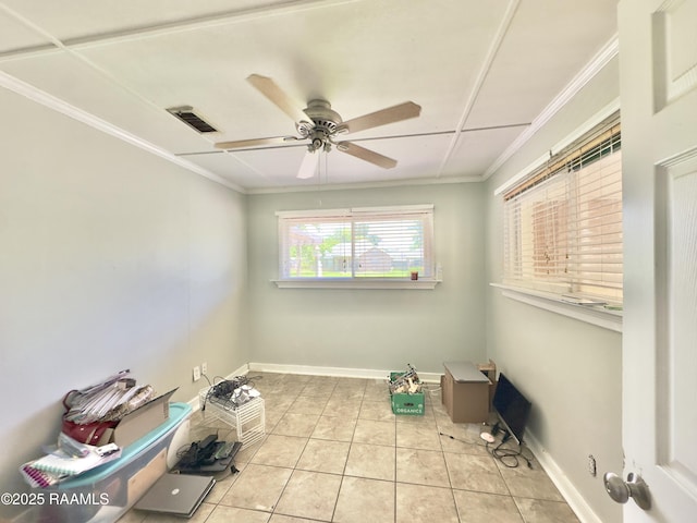 820 Genevieve Dr, Lafayette, LA 70503 - tiled empty room featuring baseboards, visible vents, a ceiling fan, and crown molding