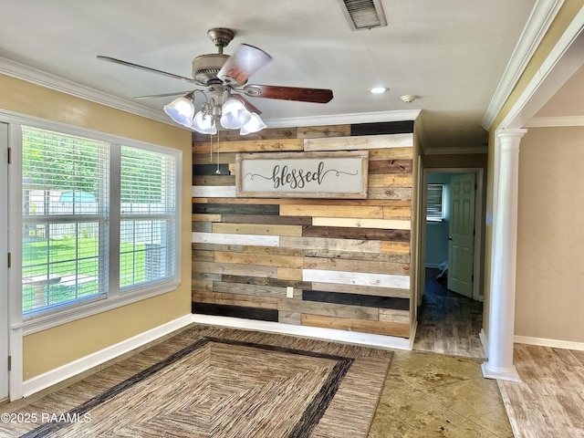 820 Genevieve Dr, Lafayette, LA 70503 - interior space with crown molding, visible vents, wooden walls, ornate columns, and a ceiling fan
