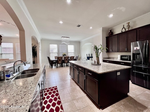 1935 Heberts Pass, Lake Charles, LA 70607 - kitchen featuring fridge with ice dispenser, arched walkways, dishwasher, a sink, and crown molding