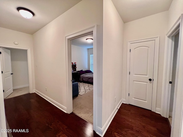 1935 Heberts Pass, Lake Charles, LA 70607 - hall featuring dark wood-style flooring and baseboards