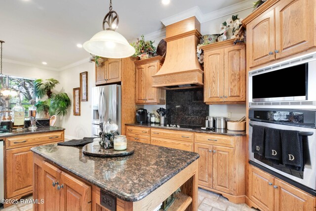 kitchen with recessed lighting, premium range hood, a center island, decorative backsplash, and appliances with stainless steel finishes