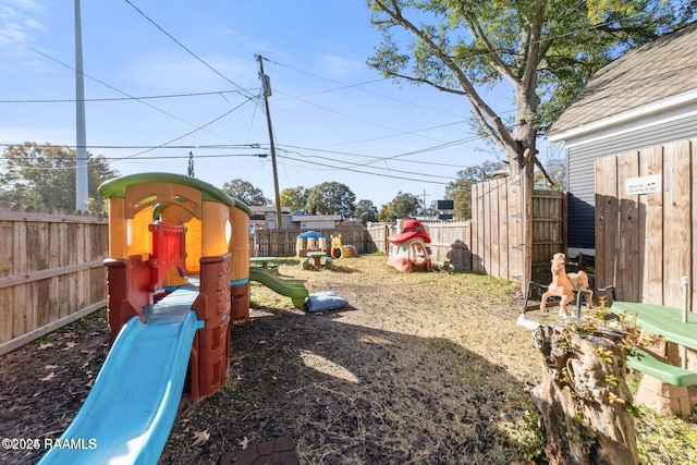 view of jungle gym featuring a fenced backyard