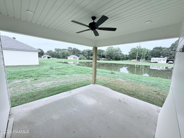 214 Berchman Oaks Dr, Lafayette, LA 70506 - view of patio with a water view and ceiling fan
