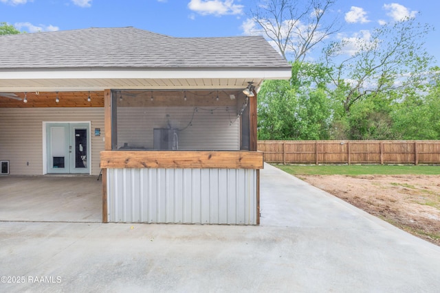 view of patio / terrace featuring fence