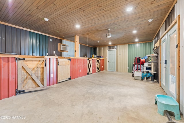 view of horse barn with a wall mounted AC