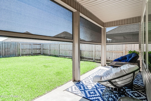 exterior space with a fenced backyard and a patio area