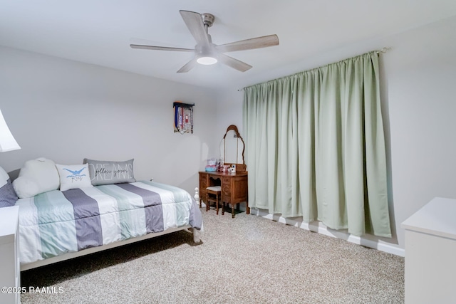 carpeted bedroom with a ceiling fan