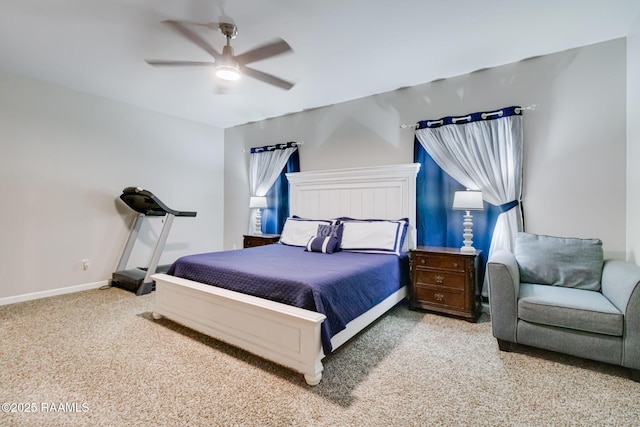 carpeted bedroom featuring a ceiling fan and baseboards