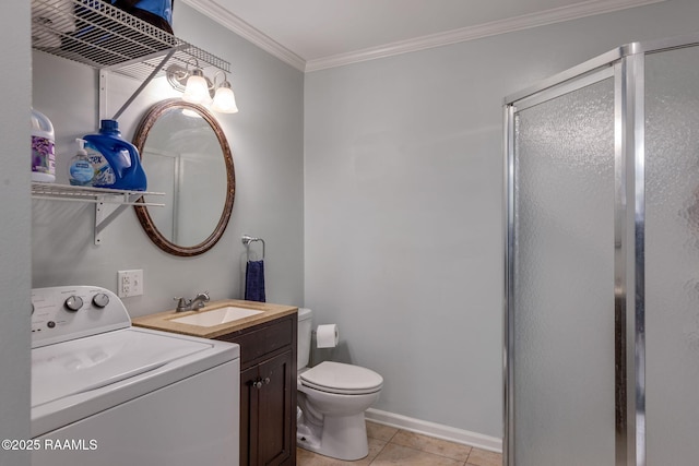 full bathroom featuring crown molding, tile patterned flooring, a stall shower, toilet, and washer / dryer