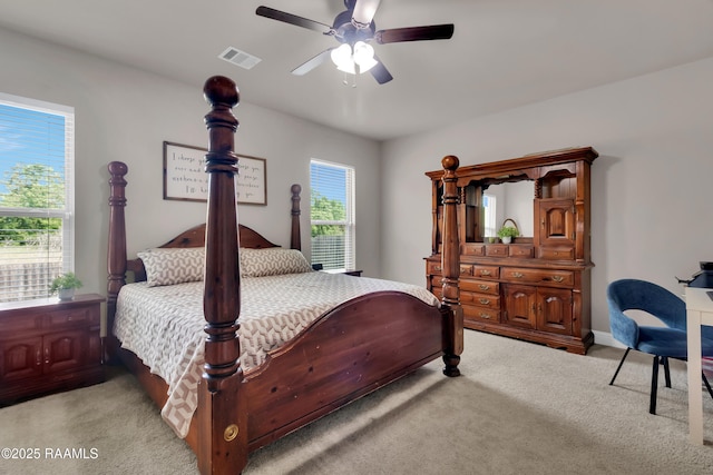 113 Spider Lily Ln, Lafayette, LA 70508 - bedroom featuring baseboards, visible vents, light colored carpet, and ceiling fan