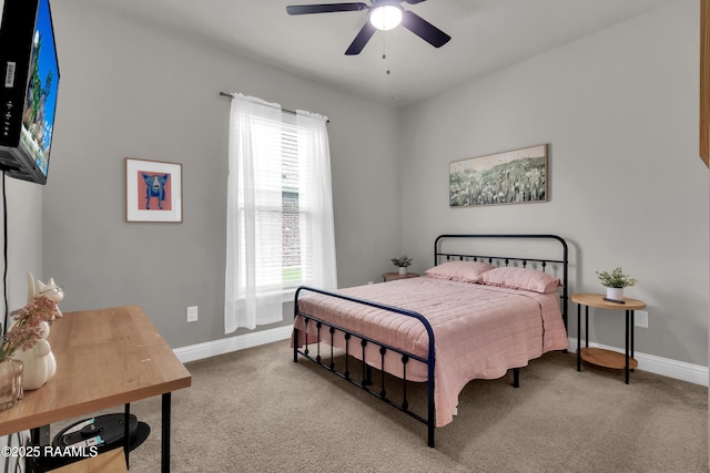 113 Spider Lily Ln, Lafayette, LA 70508 - carpeted bedroom with a ceiling fan and baseboards
