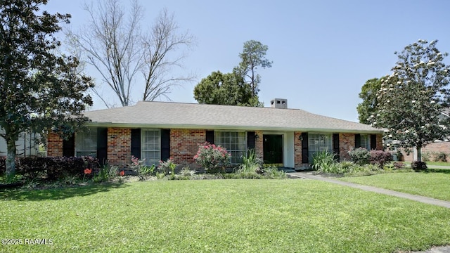 304 Broadmoor Blvd, Lafayette, LA 70503 - single story home with a chimney, brick siding, and a front yard