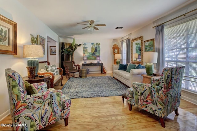 304 Broadmoor Blvd, Lafayette, LA 70503 - living area with baseboards, a ceiling fan, and wood finished floors