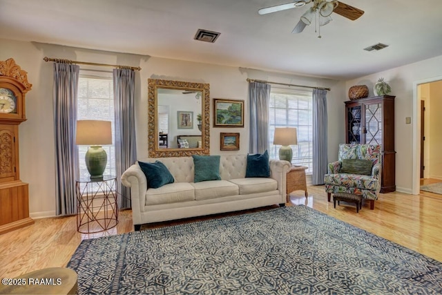 304 Broadmoor Blvd, Lafayette, LA 70503 - living area with baseboards, a ceiling fan, visible vents, and light wood-style floors