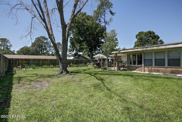 304 Broadmoor Blvd, Lafayette, LA 70503 - view of yard with a fenced backyard and a patio