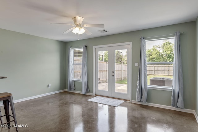 1612 Dehart Dr Unit A, New Iberia, LA 70560 - doorway to outside with concrete floors, a healthy amount of sunlight, baseboards, and french doors