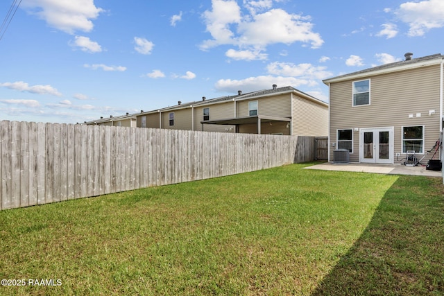 1612 Dehart Dr Unit A, New Iberia, LA 70560 - view of yard featuring a fenced backyard, french doors, central AC, and a patio