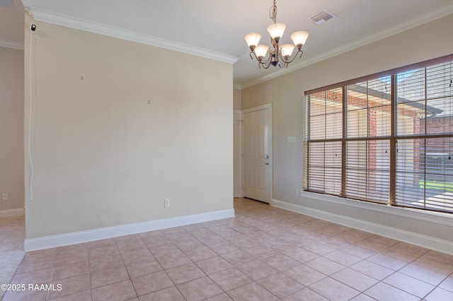 spare room featuring crown molding, plenty of natural light, visible vents, and a chandelier