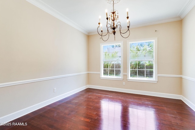 unfurnished room with crown molding, baseboards, a notable chandelier, and dark wood finished floors